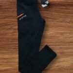 Calza larga con bolsillo  7017'4 negro c/naranja